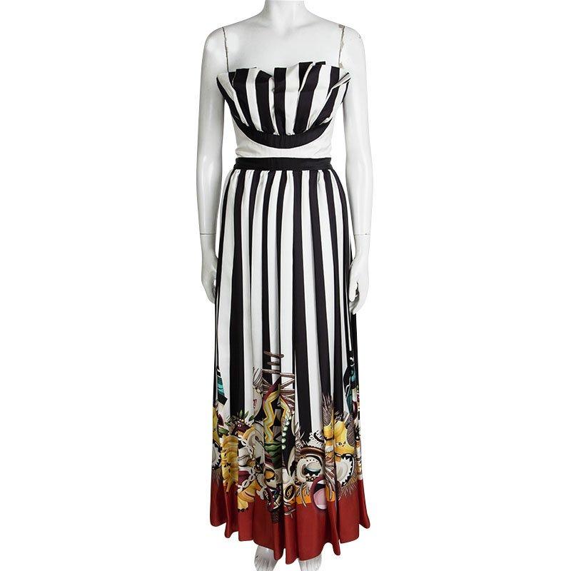 You're ready to cast a spell with this amazing Tribal Couture maxi dress from Dsquared2. This maxi number is made of 100% silk and features a printed stripe pattern all over with a multicolor tribal pattern at the bottom.The strapless creation also