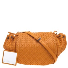 Bottega Veneta Orange Intrecciato Leather Drawstring Crossbody Bag