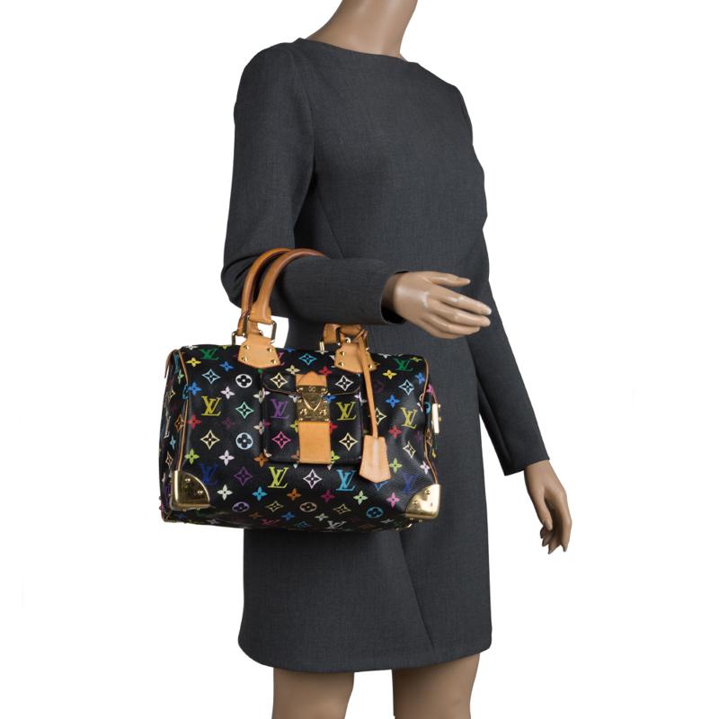 A traditional style that takes you back to the 1960’s, Speedy was one of the first bags made by Louis Vuitton for everyday use. Black in color the bag is crafted from Louis Vuitton's multicolor monogram canvas. It has gold tone hardware and enough