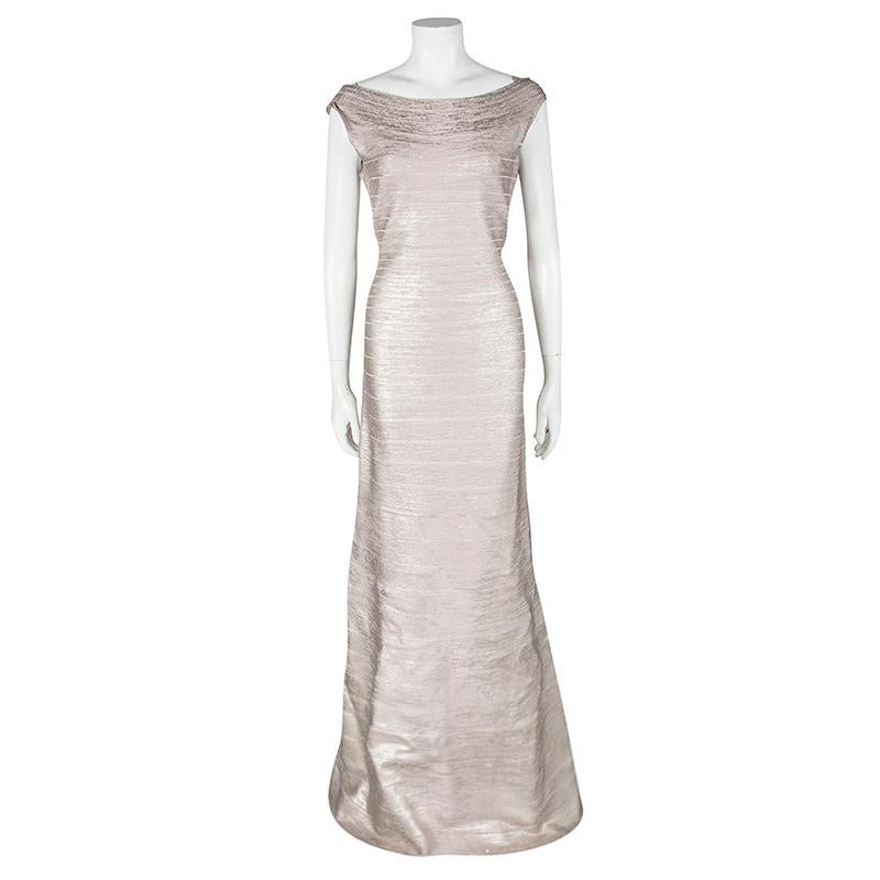 Herve Leger's Bandage creations are a craze amongst women around the world, and why not! This Sophia gown is so beautiful you'll look like a dreamy vision every time you slip into it. Flaunting a metallic shade with the signature bandage strips, the