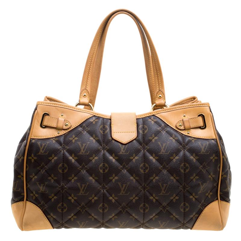 Louis Vuitton's Etoile shopper bag is made from signature Monogram canvas and styled with leather trims. The bag features dual top handles, buckle strap detailing on the sides and gold tone hardware. The twist lock closure opens to a spacious