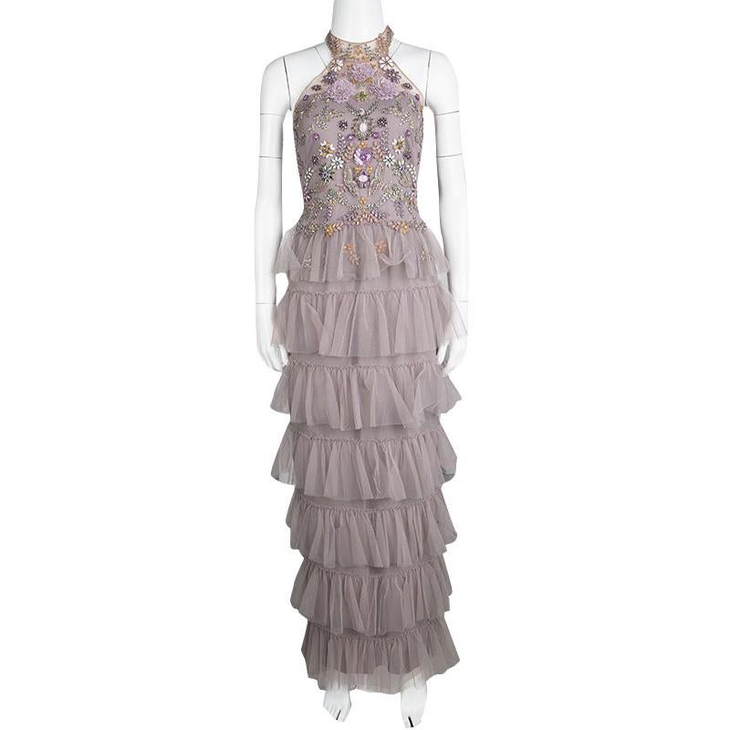 Perfectly translating the feminine and elegant looks of the Marchesa Notte pieces, this stylish and chic gown will instantly make you red carpet ready. Designed in a pastel purple fabric, this stunning piece features multicoloured stones and sequins