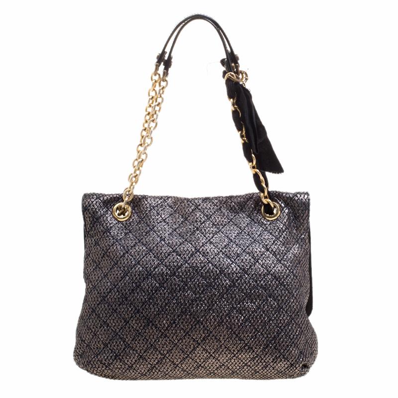 Beautifully designed to fit your essentials for the day, this stunning Lanvin Happy shoulder bag will easily pair with your evening looks for a glamorous finish. Crafted in metallic grey leather, this bag features quilted pattern all over with