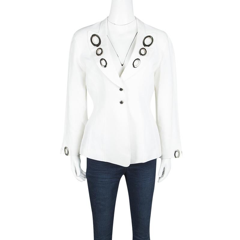 Chic embellishments that turn heads everywhere and a finely tailored silhouette has made sure this blazer by Thierry Mugler remains a classic piece of elegance in your wardrobe. The paneled structure adds shape to its form so that it can be sported