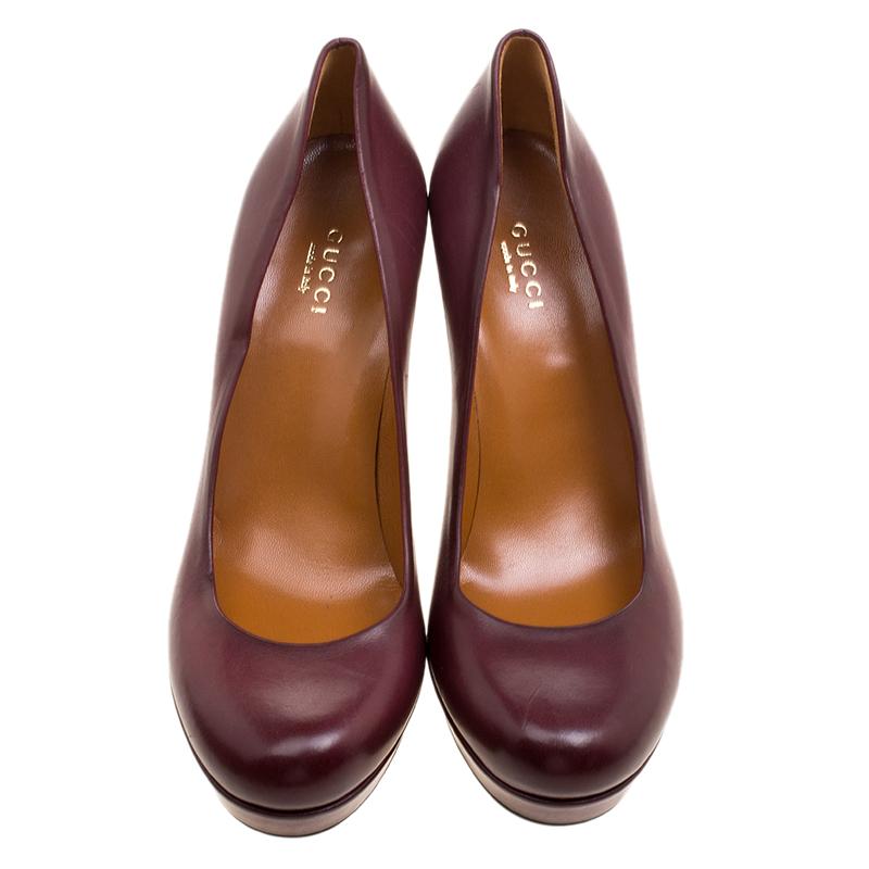 What beauty are these pumps from Gucci! Carrying sleek maroon exteriors made from leather, these pumps are so fashionable. They'll help you stand tall with the platforms and the 11 cm heels.

Includes: Original Dustbag