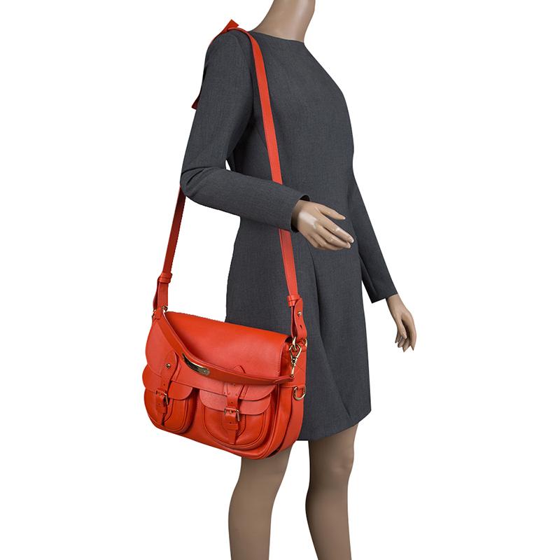 A retro and casual design, this multipurpose accessory will give you a spontaneous look of being contemporary and cool. This orange bag, made with the best materials will seamlessly fusion with your grand and classy getup. Flaunt your rich and