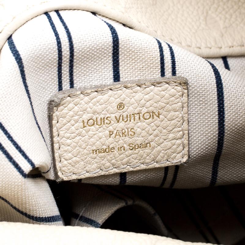 Louis Vuitton Cream Monogram Empreinte Leather Artsy MM Bag In Good Condition In Dubai, Al Qouz 2