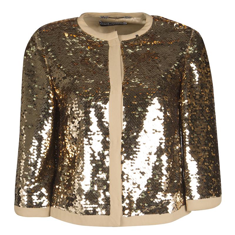 Get this Dolce and Gabbana sequin jacket to don a glamorous look for your evening outings. The visually delightful sequin embellishments add to this well-crafted jacket. It has buttoned closure and comfortable quarter sleeves. Tailored for the