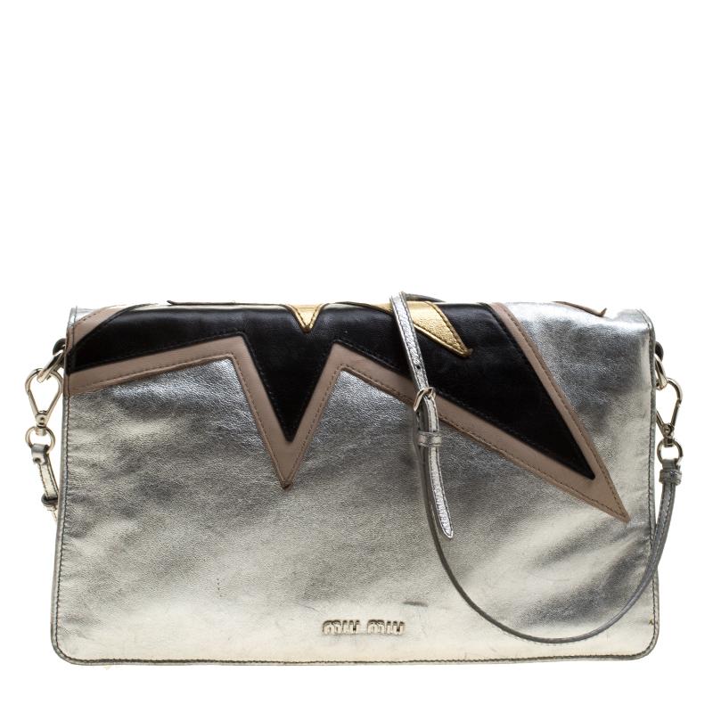 Be a star and steal the show with this stylish shoulder bag. This is a sparkling Miu Miu brand silver-golden diagonal shoulder bag with a rare designer strap. It has golden buckle lock in the front and a three-layered compartment space within for