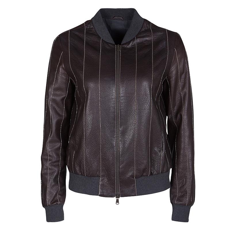 Bomber jackets have been trending for some time now and this Brunello Cucinelli creation just might be the right choice for you to join the fashion wave. Brown in shade, the jacket has been made from leather and styled with embellishments, a front