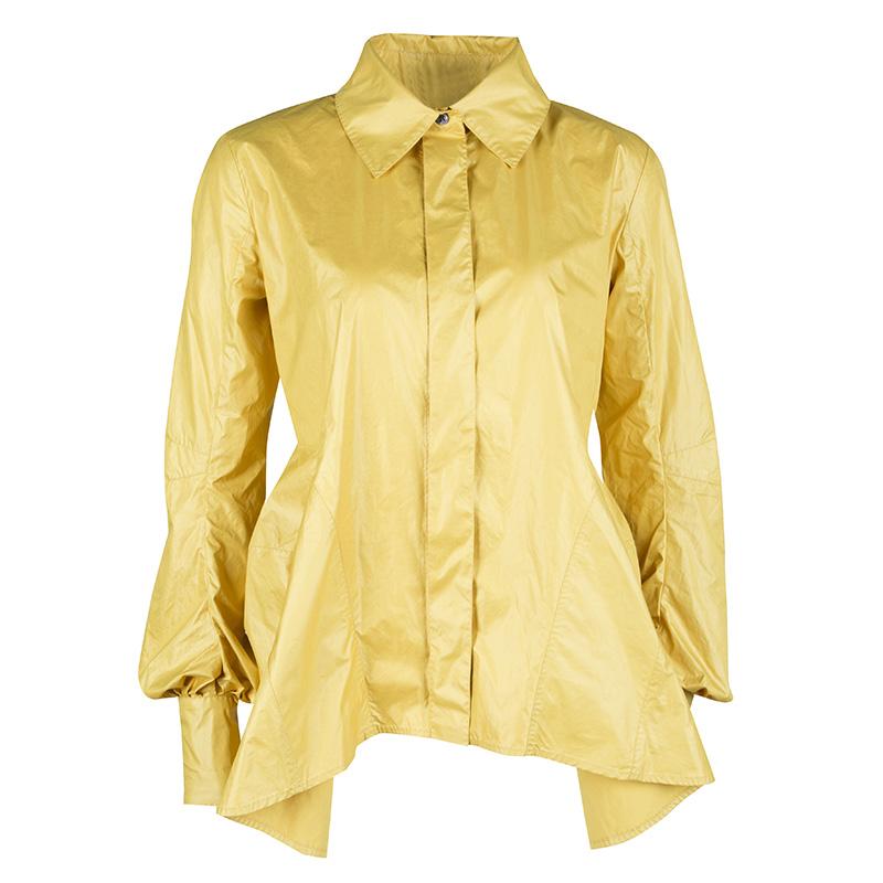 Just the right choice to elevate one's fashion quotient is this shirt from Louis Vuitton! It has been tailored from quality fabrics in a top stitch manner and designed with front buttons, balloon sleeves and an asymmetric hem.

Includes: The Luxury
