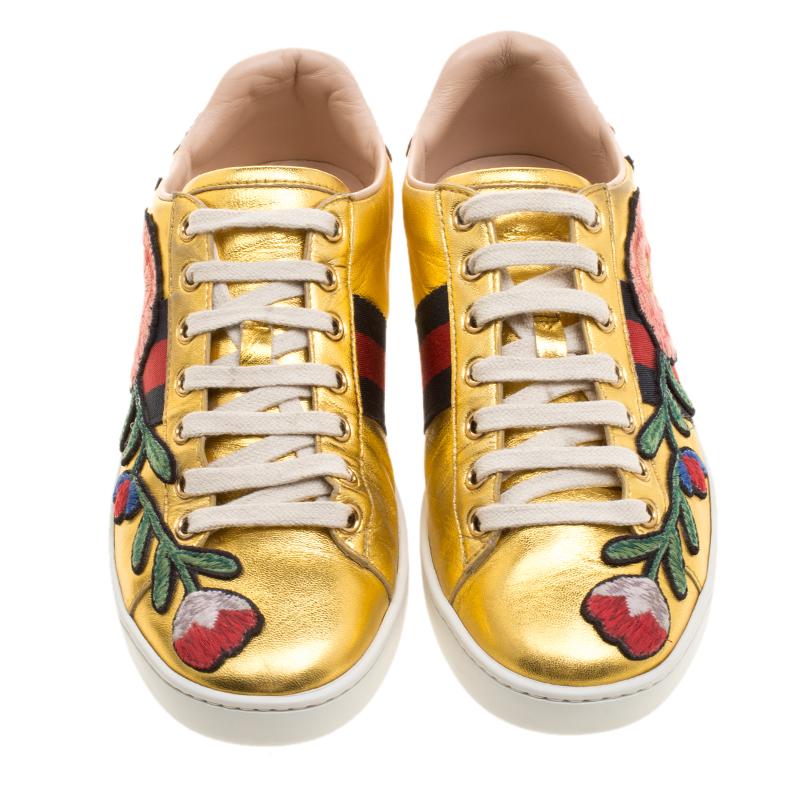 For the experimental and unique fashion lovers, this stunning pair of Gucci low top sneakers will add that statement glamour to your look that will catch the attention of the crowd. Crafted in gold leather, this beautiful pair of shoe features