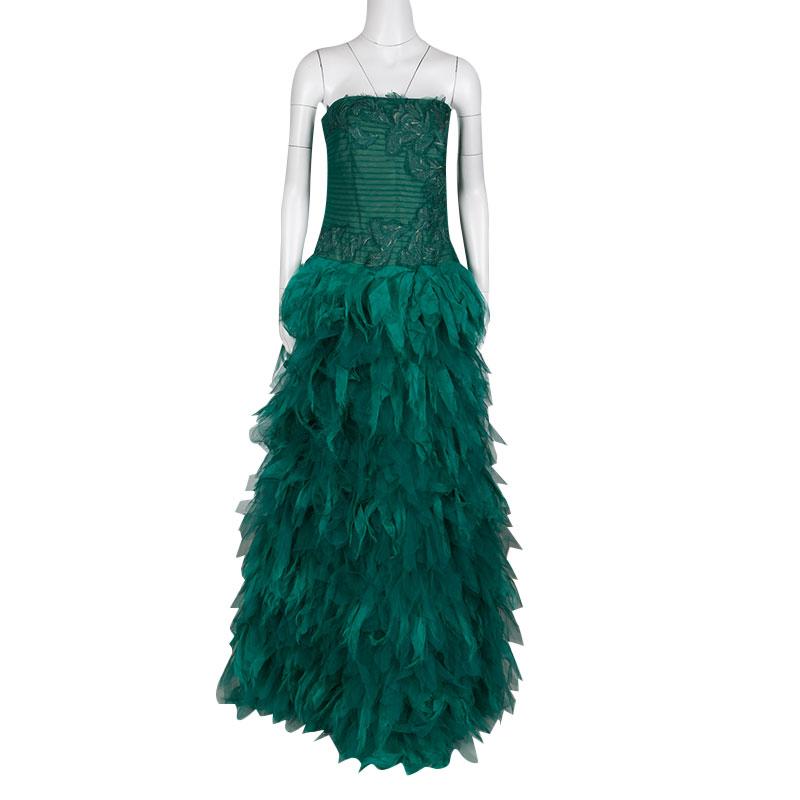 Masterfully constructed in nylon, this dress will make a perfect piece for celebratory events. This green gown, featuring a fitted bodice and flowy feathered skirt, also comes with a zip to create a favorable shape. From Fall Winter 2015 collection,