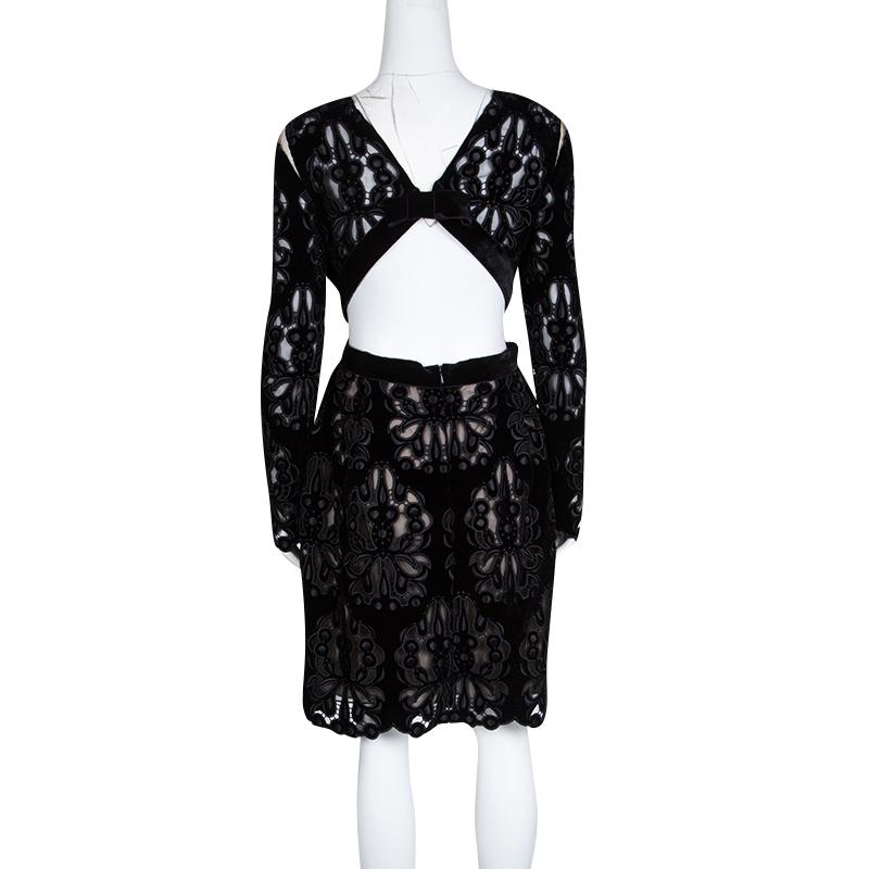 This stunning Franzi dress was the opening outfit of Erdem's 2014 Autumn Winter collection which was heavily influenced by the color black. The dress reveals a unique laser cut detail and is designed with a stylish cutout rear. Pair this with black