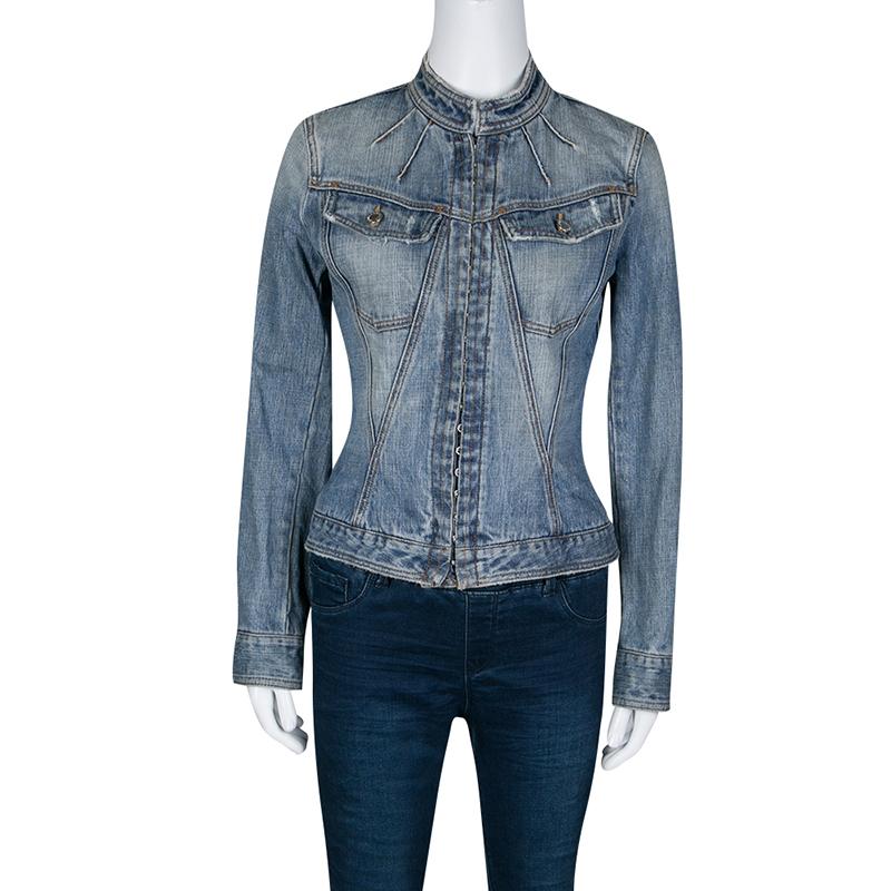 Elevate your casual looks with this denim jacket from the house of Dolce and Gabbana. Crafted with 100% cotton, the distressing along the collar, pockets, and hem add a contemporary style to this piece. You'll love how the jacket has concealed hook