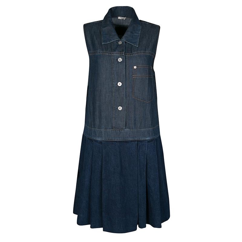 Miu Miu's sleeveless denim dress is crafted in a colorblock style that makes it look like separates. The bodice is adorned with a faux pocket detail while the bottom is pleated to lend a fluid shape. Crafted with lightweight cotton, wear yours with
