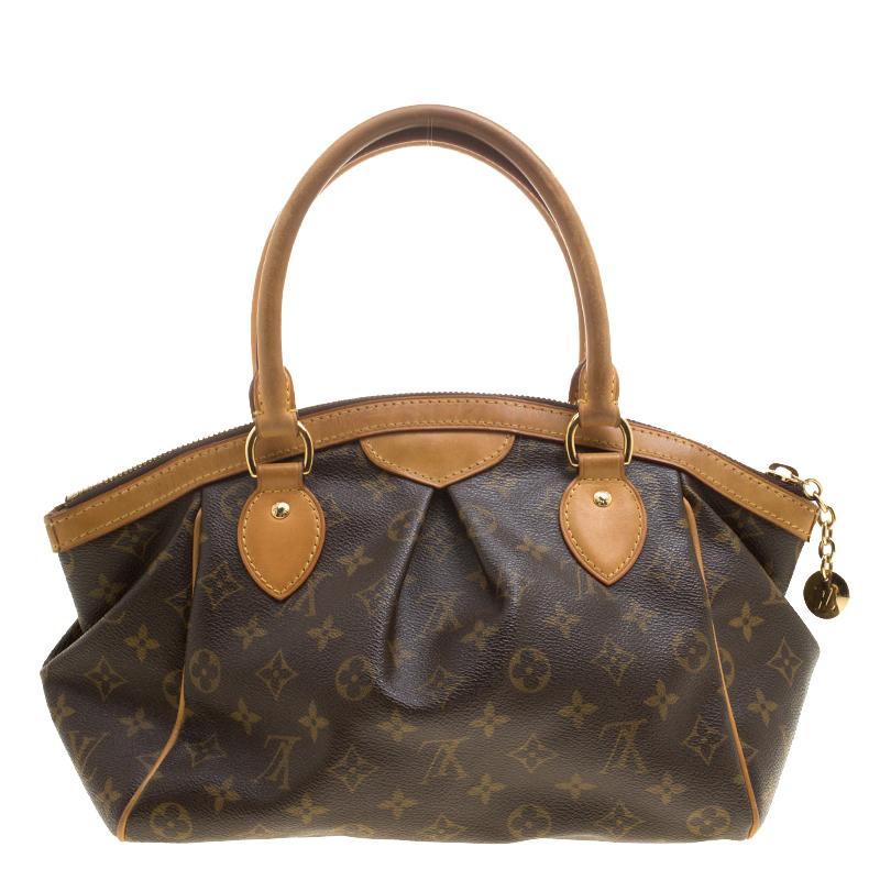 Everybody wants a handbag as good as this one. From the house of Louis Vuitton comes this gorgeous Tivoli PM bag that is both stylish and handy. Crafted from their signature Monogram canvas, the bag has two sturdy leather handles, protective metal