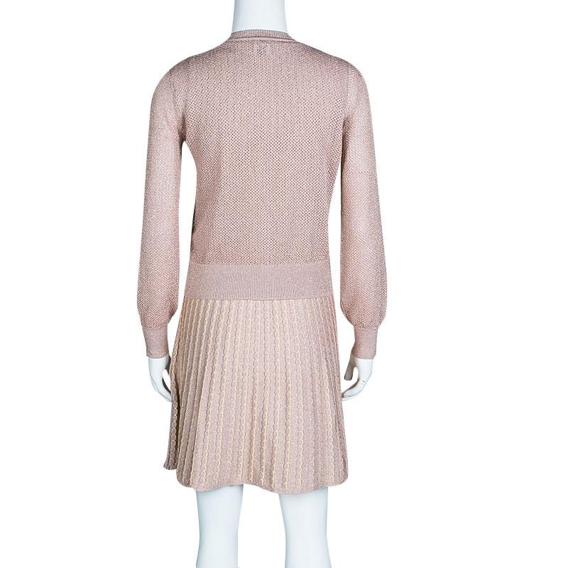 This fabulous set is from M Missoni and it delights in a dress and a matching cardigan. They've been knit from the finest fabrics with the dress designed in a sleeveless style and patterns while the perforated cardigan features long sleeves and full