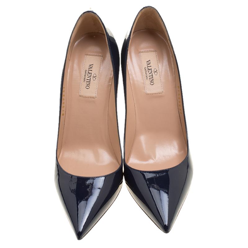 These sky stiletto heels make for the perfect pair to work with your statement formal wears as well as your elegant evening wardrobe. Crafted with blue patent leather, this Valentino creation features sharp, pointed toes and 10 CM high heels. The