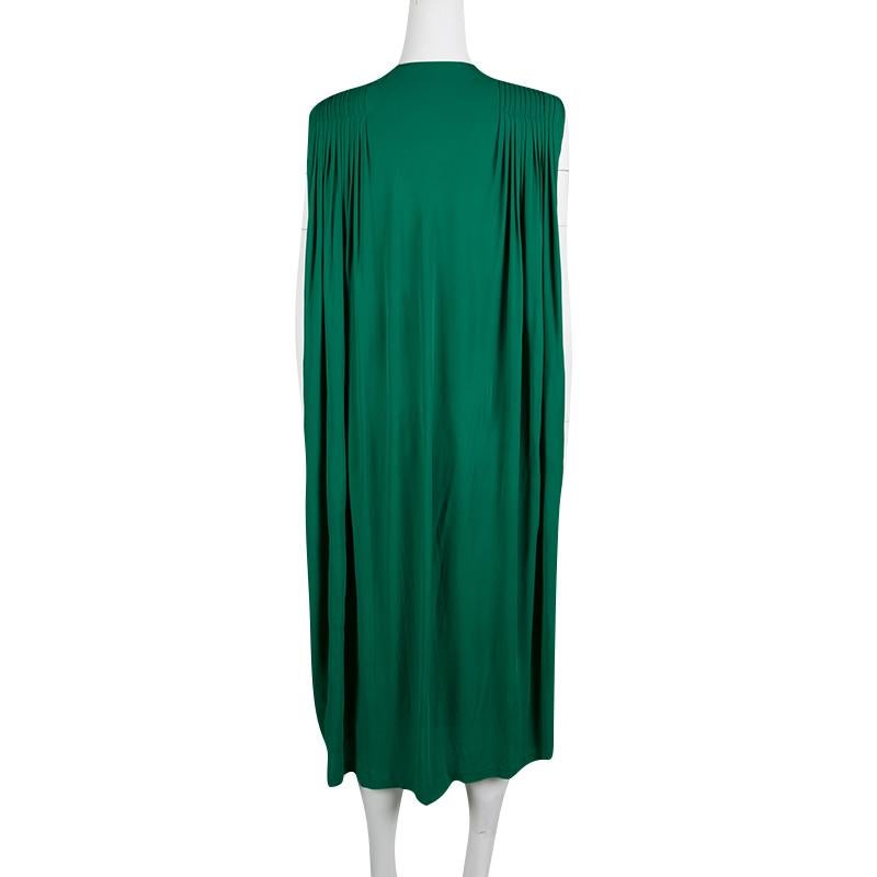 Cut to a fabulous silhouette, this dress will be your go-to outfit for any occasion. Bring out the perfect look of this green dress by pairing it with statement accessories. This urbane dress from the house of Alexander McQueen features an elegant