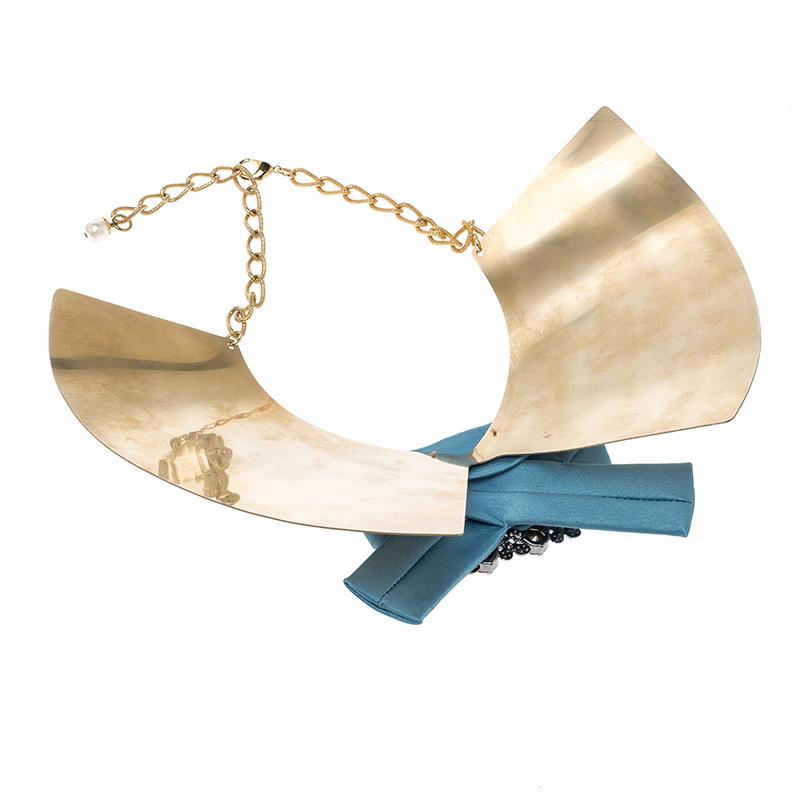 Dolce and Gabbana have created the most unique of designs for your quirky choices in fashion. This bow detail necklace is simple and stylish and is a multipurpose accessory that can glam up almost any neckline. The necklace is embellished with