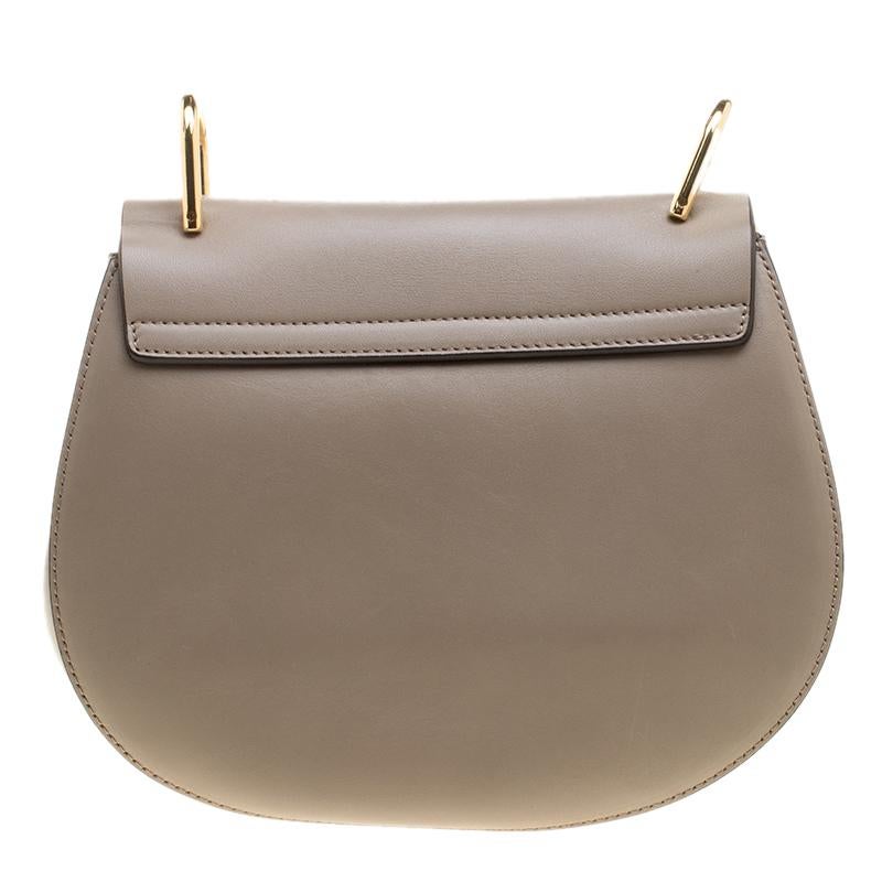 One of the most recognizable bags in the luxury world, Chloe's Drew bag was part of the label's fall/winter 2014 collection. It carries a distinct shape and minimal style detailing. This shoulder bag has been meticulously crafted from suede and