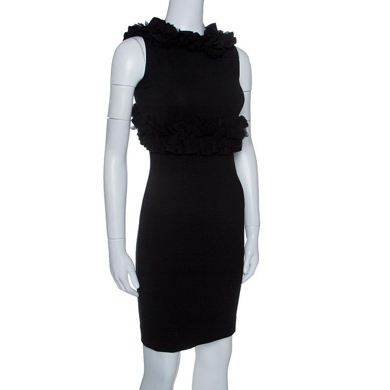 This creation by DSquared2 is so perfect it will not only give you a fabulous fit but will also lift your spirits because wearing good clothes can give one a pleasant feeling. In a black shade, this bodycon dress flaunts ruffle trims and a side