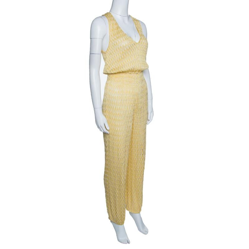 Missoni Mare's sleeveless jumpsuit exudes an understated, yet stylish approach to casual dressing. Flaunting perforated knitting, the jumpsuit features smocked waist and cutout detail at the rear. Team this with chic accessories and pointed