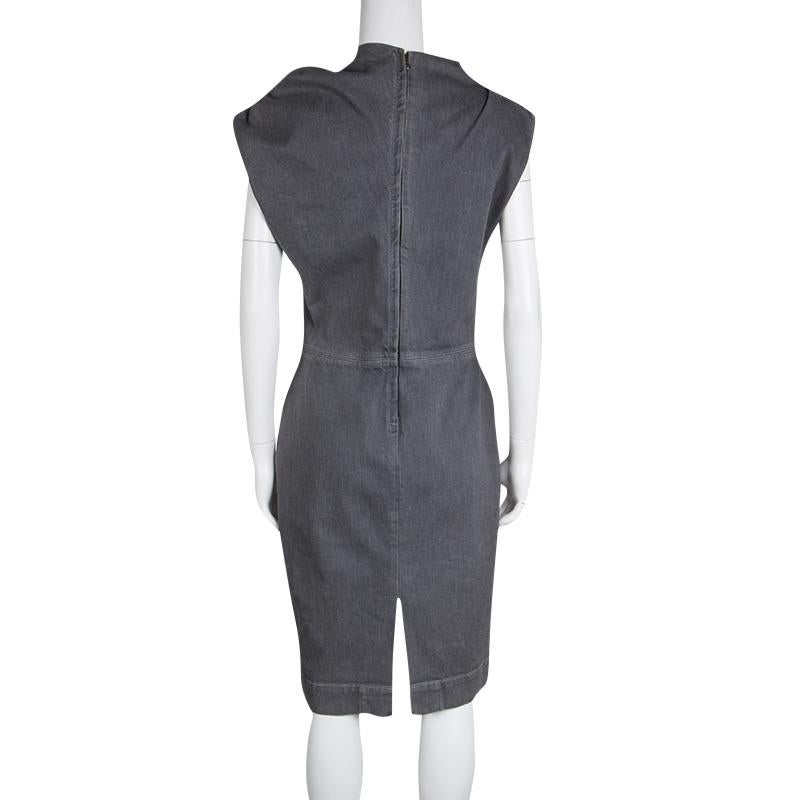 Beautifully designed using the most commonly worn denim fabric, this stunning Lanvin X Acne sleeveless dress creates all kinds of chic and stylish vibes that is hard to miss. The grey washed denim is used to create this flattering dress featuring a