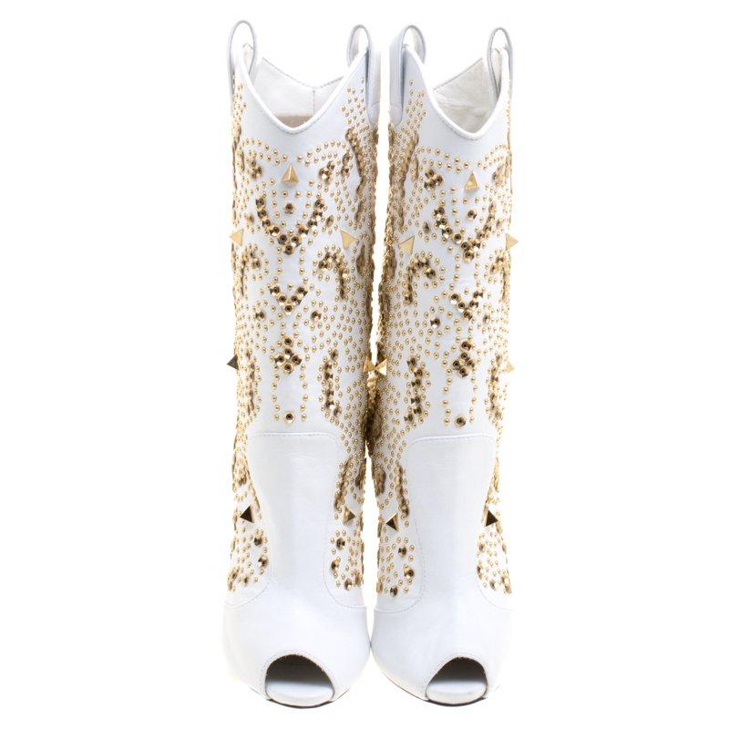 Presenting a fabulous infusion of craftsmanship and high-fashion, these mid-calf boots from Giuseppe Zanotti will help you easily express your personal style. They've been excellently crafted from leather and detailed with studs and peep toes. The
