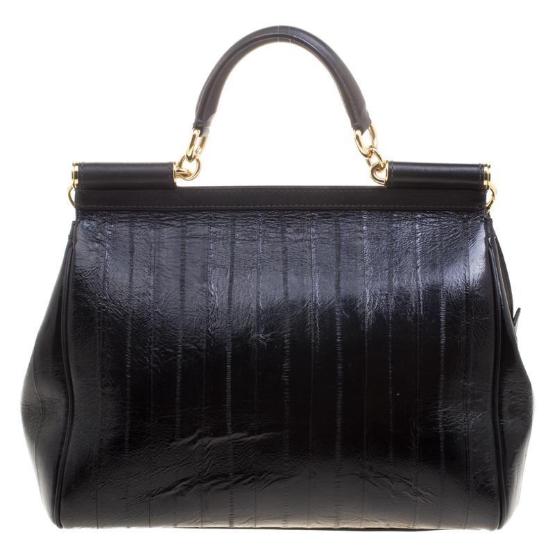 The Miss Sicily tote is one of the most celebrated creations from Dolce and Gabbana. The tote beautifully embodies the spirit of extravagance and feminity that the Italian luxury brand carries. Crafted from striped leather the tote has a structured