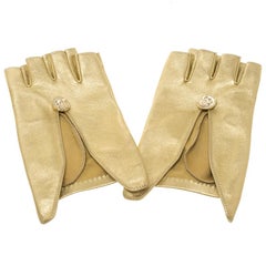 Chanel Gold Leather Fingerless Gloves 7.5 For Sale at 1stDibs  chanel  fingerless gloves, chanel fingerless leather gloves, fingerless gold gloves