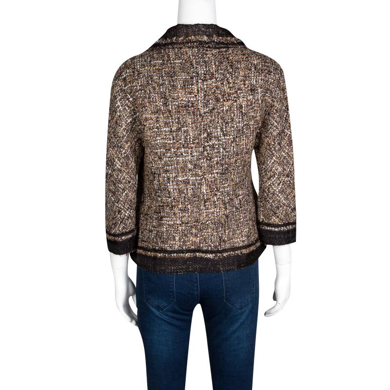 Contemporary look and classic feel, this D&G collared jacket is perfect if you fancy something understated to pair with your jeans. The brown jacket has a textured look that imparts an easy-going style to your ensemble. Button front closure