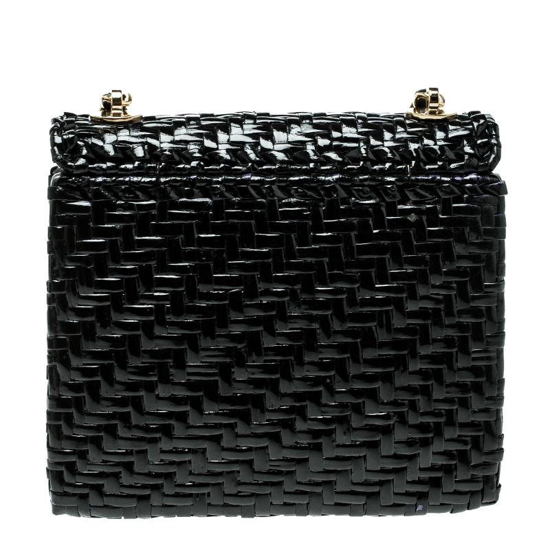 We are in absolute awe of this mini flap bag from Chanel as it is not only vintage but also highly appealing. With a leather body woven using the wicker weaving technique, the black bag brings forth a fine unison of fashion, art, and beauty. It