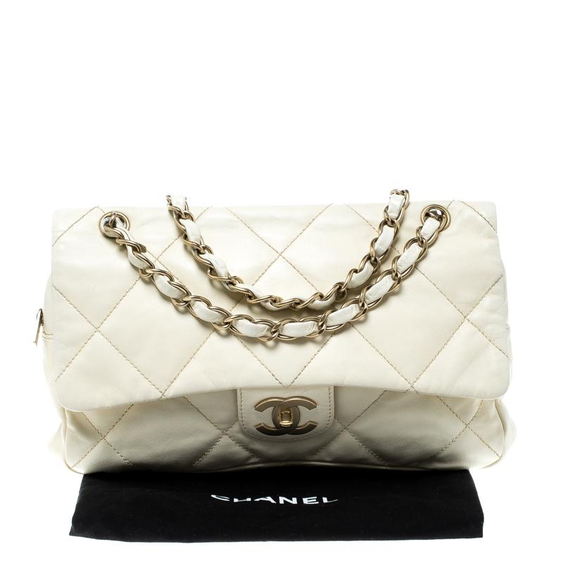 Chanel's Flap bags are iconic and monumental in the history of fashion. This flap bag is a buy that is worth every bit of your splurge. Exquisitely crafted from leather, the bag carries the signature quilted pattern all over. It has a lovely