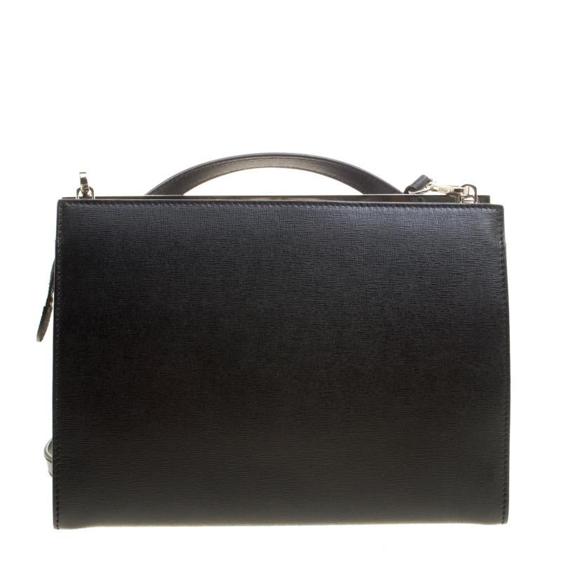 This Demi Jour bag by Fendi is not only lovely to look at, but is also handy and durable. It has been crafted from textured leather in a colourblock design and styled very artistically with a flap compartment in the front and a zipper one at the