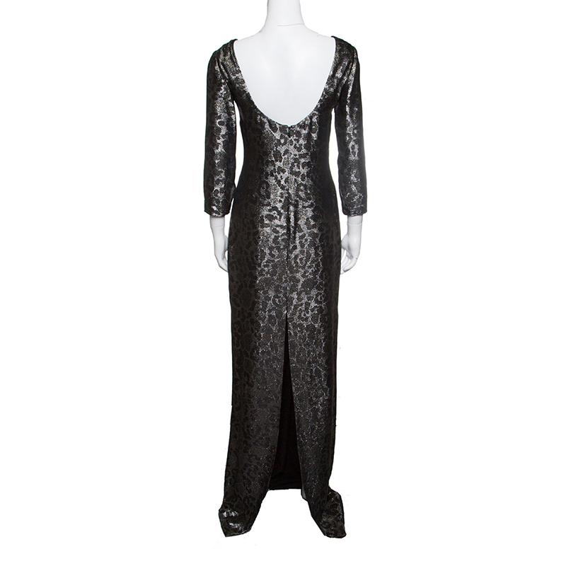 An elegant look comes with this lovely gown from Gucci that is all set to slay the crowds. Beautified with metallic animal print all over and crafted with a silk blend, it makes you look extraordinary wherever you go. The low-cut back and dramatic