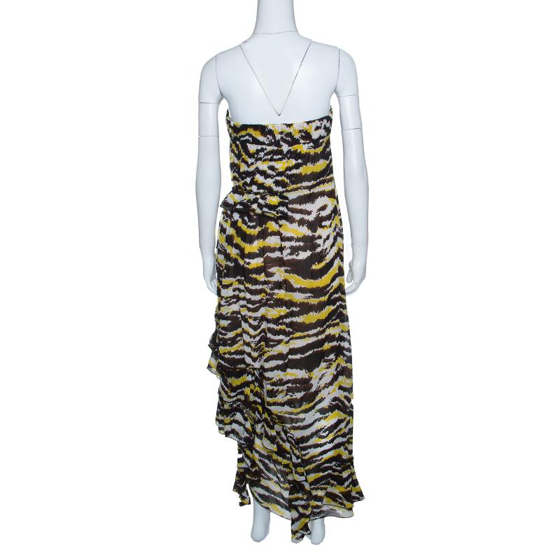 Dress to impress with this stunning strapless dress from Missoni. Perfect tailoring and designing lend a unique touch to this fabulous dress which has a strapless style with ruffle detailing, an asymmetric hem and tiger prints all over. Made in 100%