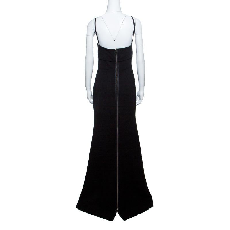 Statement silhouette and timeless hue combine to make this maxi dress a worthy closet investment. It is cut from a blend of wool and silk and is styled with a cutout detail at the bodice, slender shoulder straps and zip fastening to offer a classic
