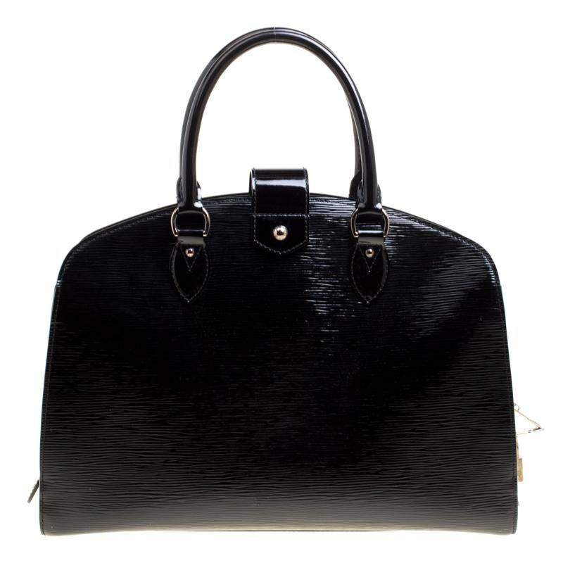 Louis Vuitton's handbags are popular owing to their high style and functionality. This Pont Neuf bag, like all the other handbags, is durable and stylish. Crafted from Epi leather, the bag comes with two top handles, a front flap securing the zip