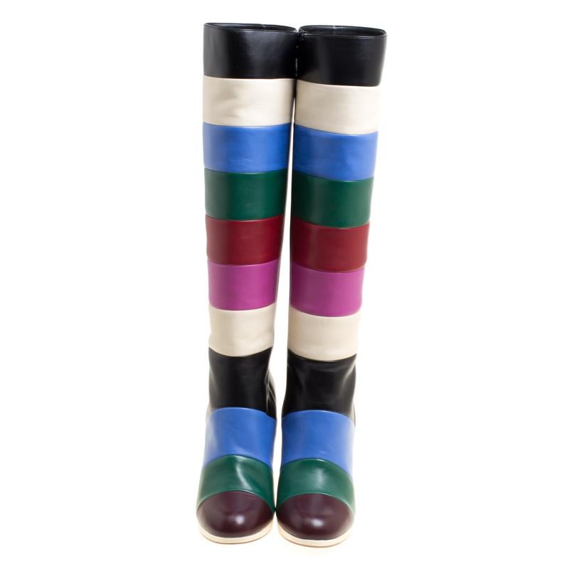 Perfect for the winter season, these Valentino knee boots are going to be your best buy. Crafted in durable and robust leather, the pair has been given a quirky and fun-spirited vibe with the eye-catching multicoloured stripes that cover these