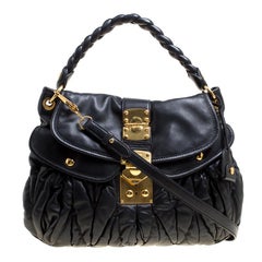 Coffer leather handbag Miu Miu Black in Leather - 30912826