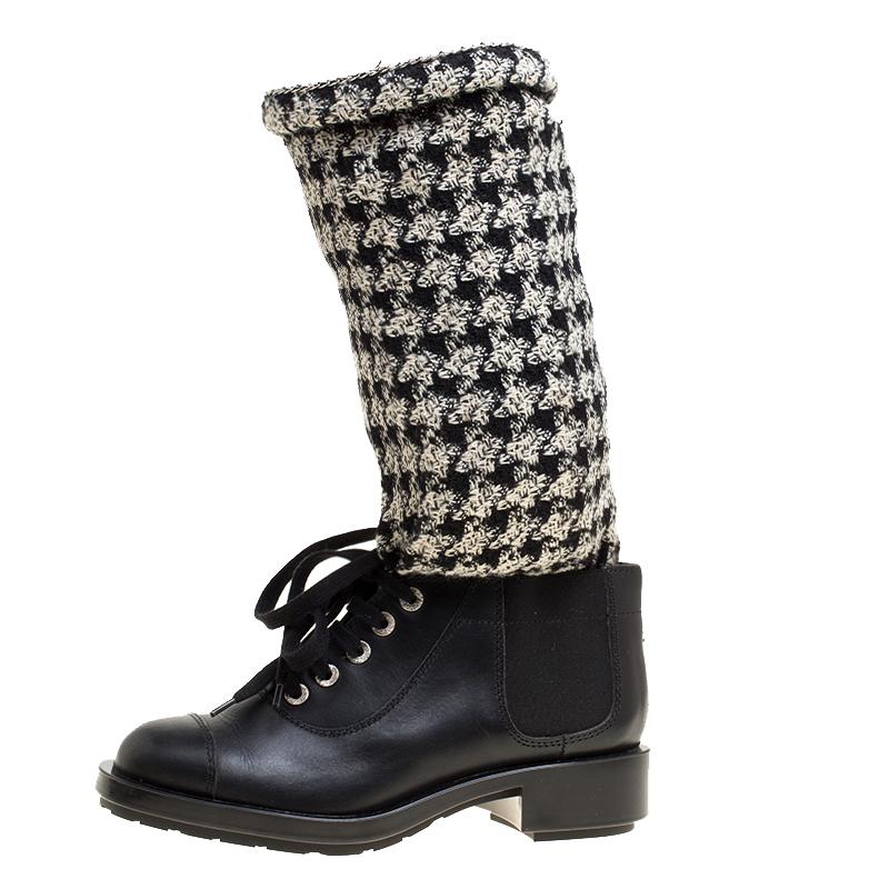 Something that catches your attention in the very first instance, these boots from Chanel are absolute wow. Designed in calf length, the boots have a black leather body that features lace-up vamps and low heels; they also have black and off-white