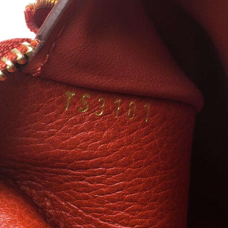 Women's Louis Vuitton Orient Monogram Empreinte Leather Compact Wallet