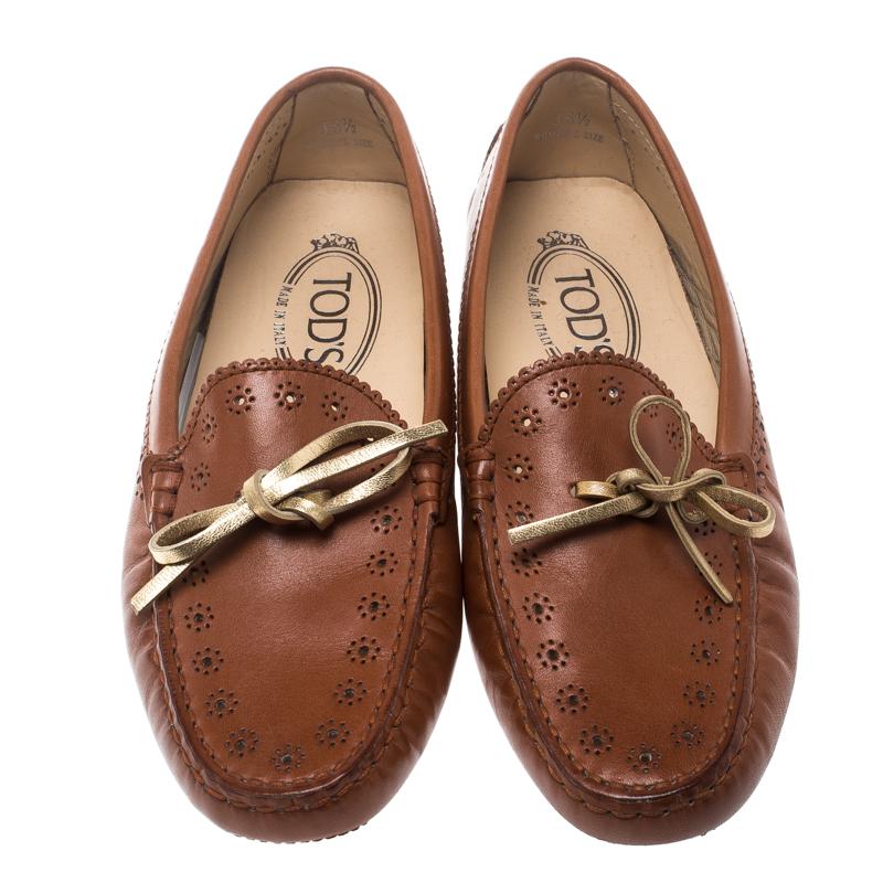 Tod's Brown Perforated Leather Bow Loafers Size 36.5 In New Condition In Dubai, Al Qouz 2