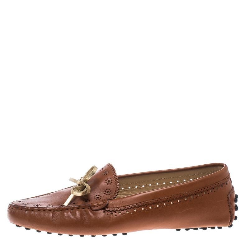 If you're looking for a pair of comfortable and trendy shoes, this Tod's creation is the answer. Crafted from brown leather and styled with lovely perforated patterns on the vamps and quarters, this pair of loafers is a blend of luxury and comfort.