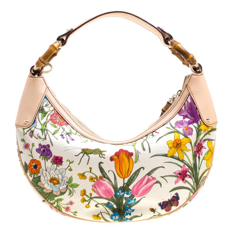 You are going to love owning this hobo from Gucci as it is well-made and brimming with luxury. The bag has been crafted from canvas and covered in beautiful floral prints, evoking the vision of a garden. It is complete with a single handle, bamboo