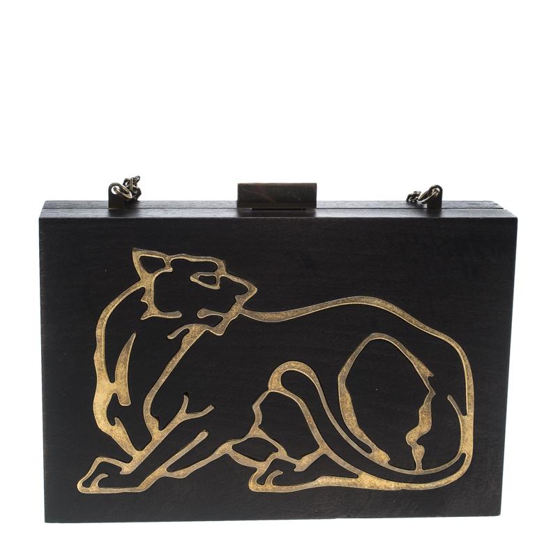 Flattering in a contemporary design is this chic clutch from Valentino. This black clutch is made of wood and features a cheetah motif in gold-tone metal skilfully embedded at the front and back. The top lock closure opens to reveal a spacious
