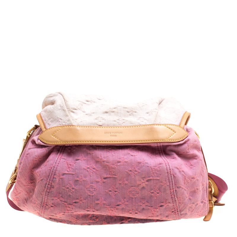 This limited edition Sunshine is from Louis Vuitton's 2010 Spring collection. Made in France, this bag has been crafted from monogram denim and covered in a beautiful ombre shade. It features a shoulder strap and a spacious Alcantara-lined interior