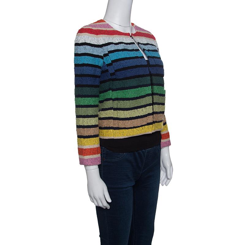 Sonia Rykiel brings to you this lovely jacket to make you look smart and stylish. This jacket is made of a cotton blend and features a rainbow striped design all over it. It flaunts a round neckline, hook fastenings at the front and long sleeves.